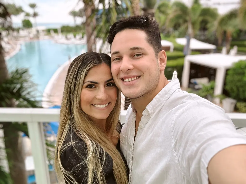 JP and Jana Infante, the married couple behind Ethos Web Development & SEO, smiling together outdoors
